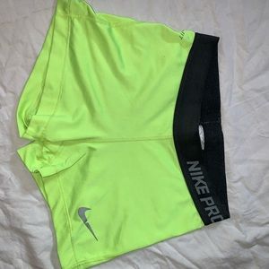 Neon green/yellow Nike pros